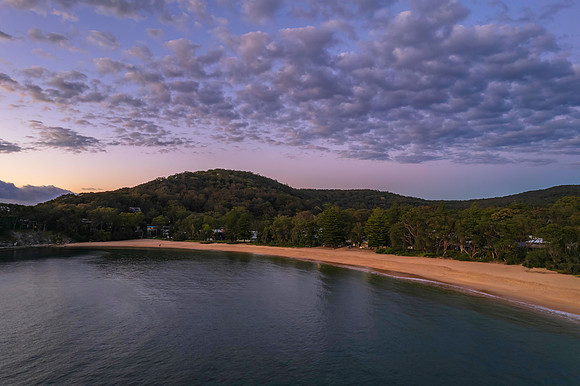 Aerial sunrise seascape with clouds