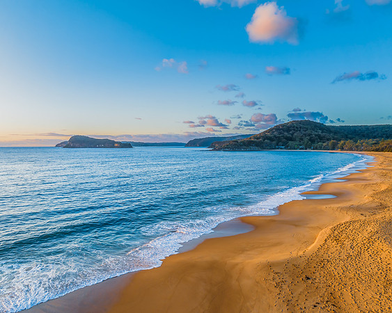 Aerial sunrise views over the ocean and beach