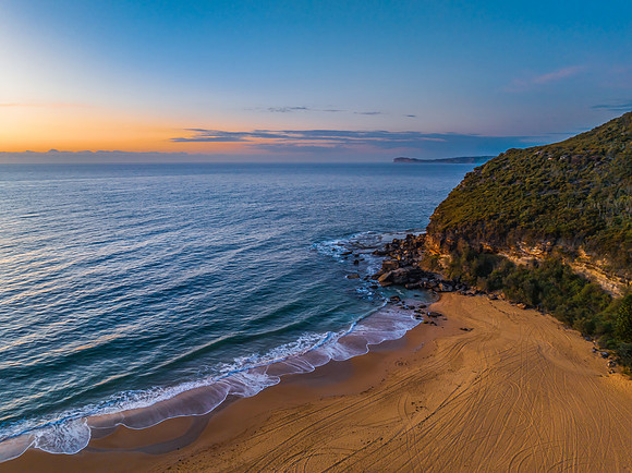 Sunrise at the seaside with orange horizon