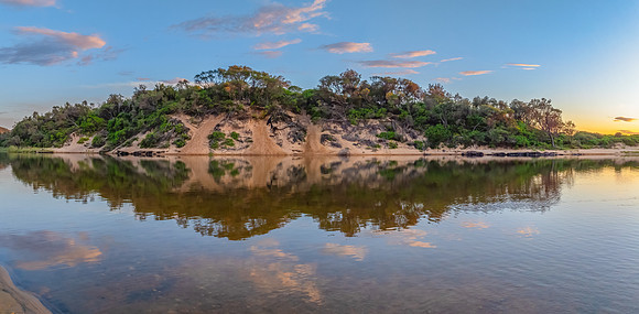 Summer sunrise at the seaside lagoon
