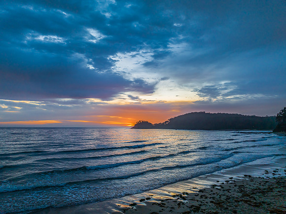 Summer Sunrise Seascape with Rain Clouds