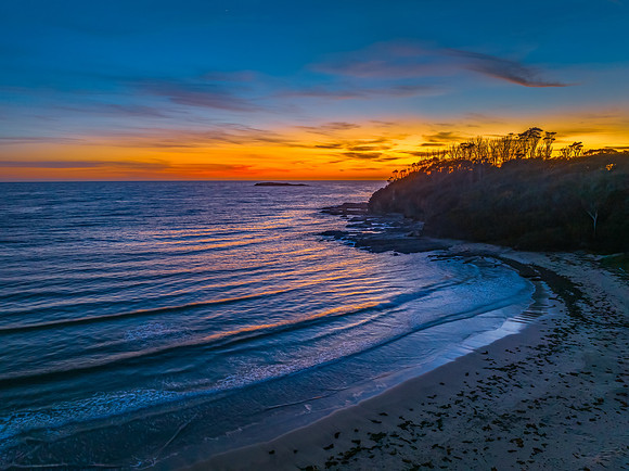 Sunrise at the seaside with high clouds