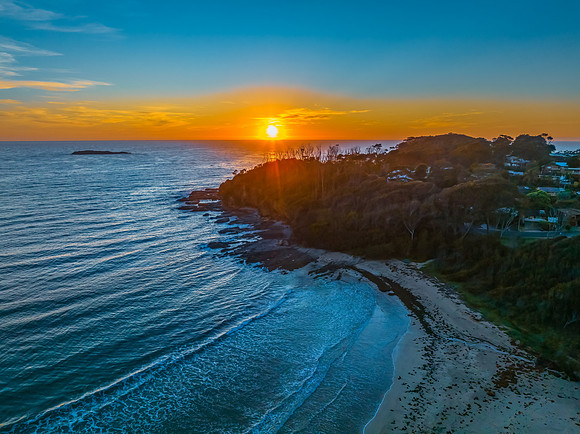 Sunrise at the seaside with high clouds