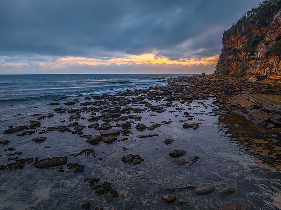 Cloud filled sunrise at the seaside