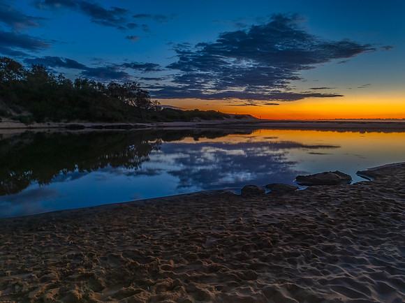 Summer sunrise at the seaside lagoon