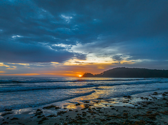 Summer Sunrise Seascape with Rain Clouds