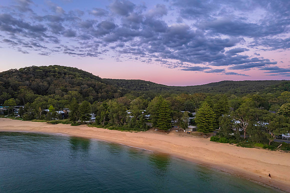 Aerial sunrise seascape with clouds