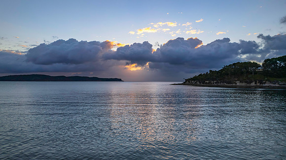 Aerial sunrise seascape with clouds
