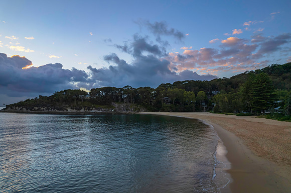 Aerial sunrise seascape with clouds