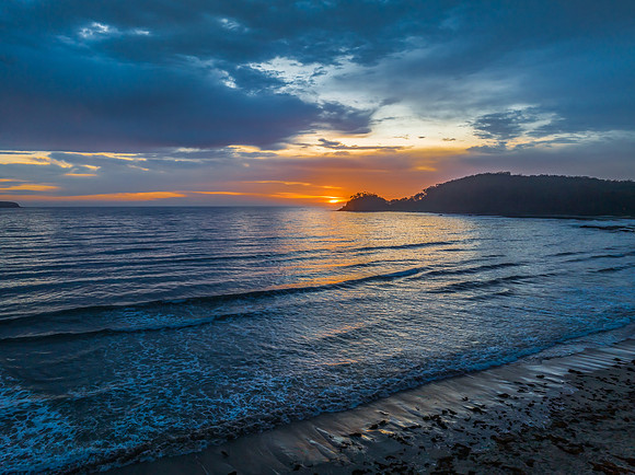 Summer Sunrise Seascape with Rain Clouds