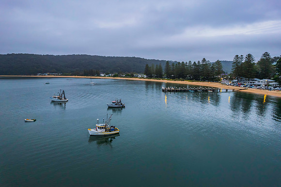 Overcast aerial sunrise over the bay