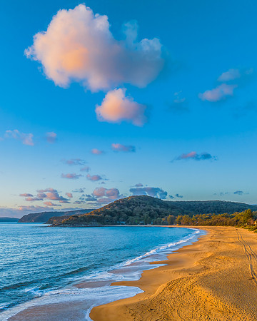 Aerial sunrise views over the ocean and beach