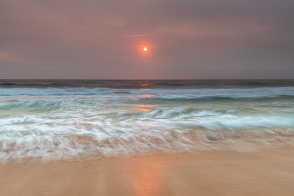 Sunrise Seascape and Hazy Sky with High Clouds