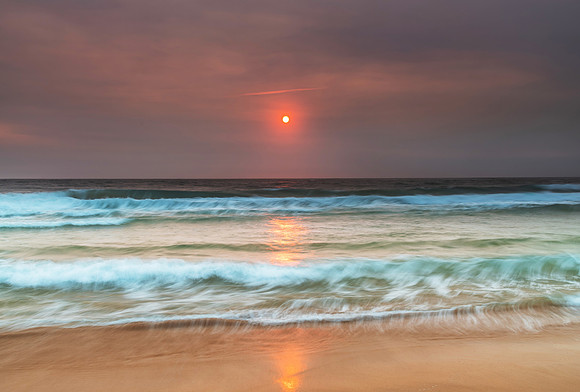 Sunrise Seascape and Hazy Sky with High Clouds