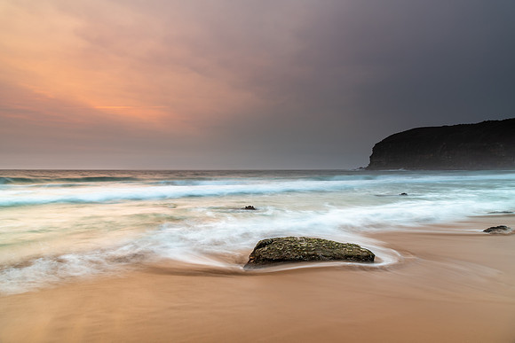 Hazy Sky with High Clouds and Rock on the Beach