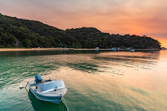Sunrise, High Clouds and Boat on the Bay