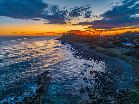 Coastal Sunrise with Rock Formations