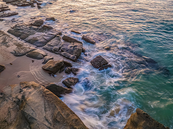 Sunrise over the sea and rocks