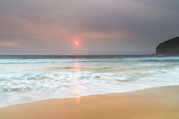 Sunrise Seascape and Hazy Sky with High Clouds