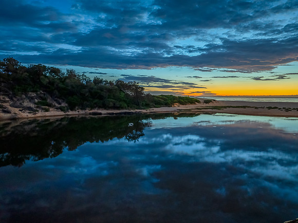 Summer sunrise at the seaside lagoon