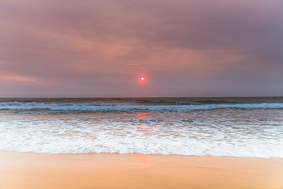 Sunrise Seascape and Hazy Sky with High Clouds