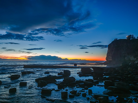 Sunrise over the ocean and rocky Inlet