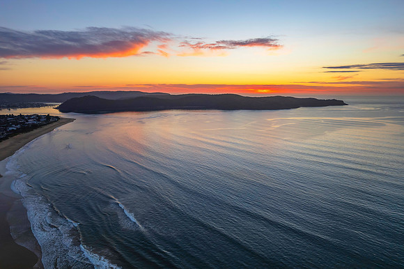 Sunrise seascape with a mix of high and medium clouds