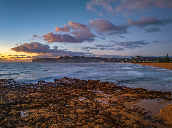 Sunrise over the sea and rock platform