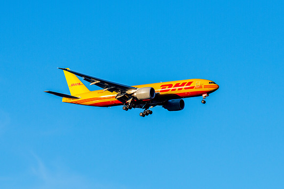 N775CK - Boeing 777-F - DHL Airline flying in the blue afternoon