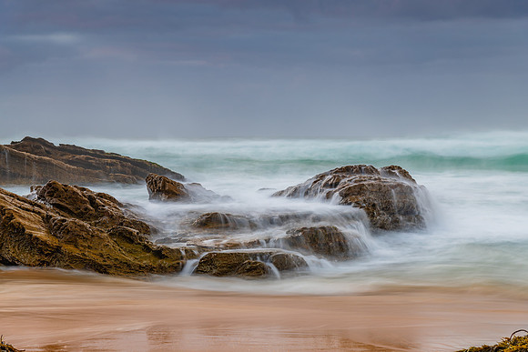 Rocks and waves - sunrise seascape at Bermagui