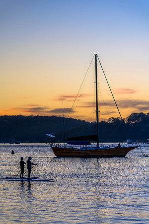 Paddleboarding around the boats at Dawn Waterscape