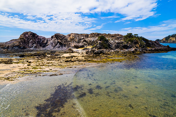 Daytime Aerial Seascape and Rock Formations