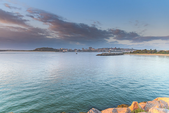 Sunrise Seascape with Newcastle on the Horizon