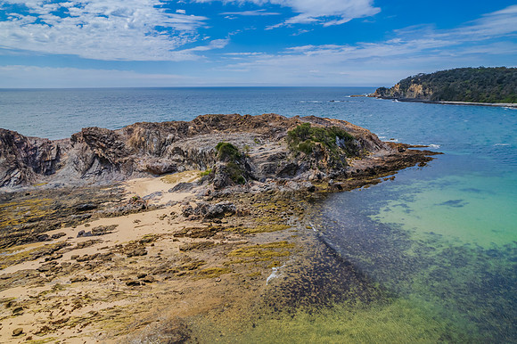 Daytime Aerial Seascape and Rock Formations