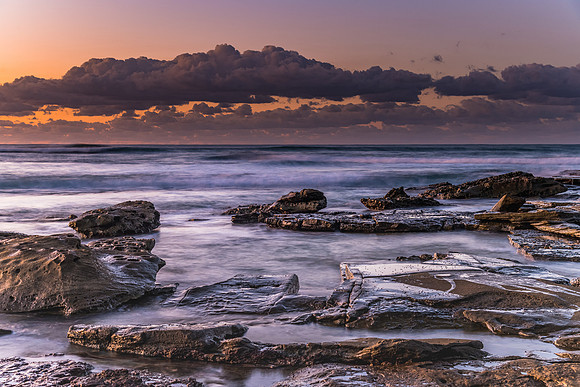Sunrise Seascape with a low cloud bank