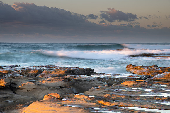 Sunrise Seascape with a low cloud bank