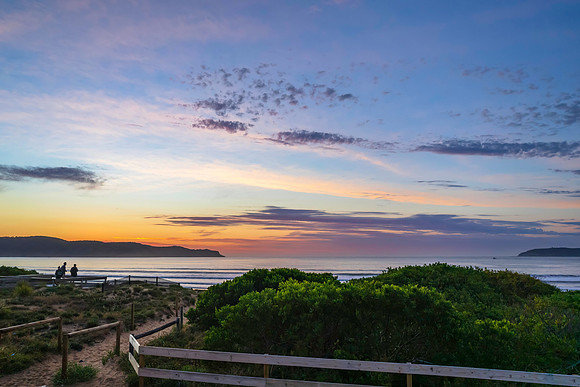 Sunrise seascape with a mix of high and medium clouds