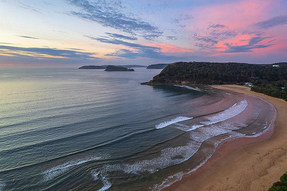 Sunrise seascape with a mix of high and medium clouds