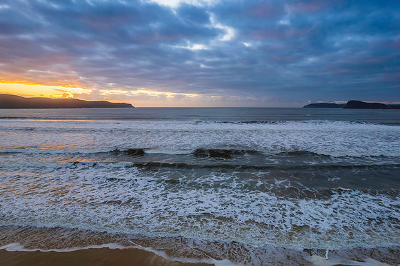 Cloudy aerial sunrise seascape