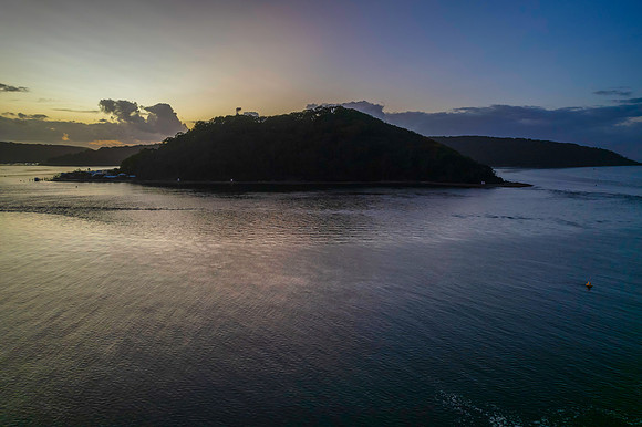 Aerial sunrise waterscape with boats