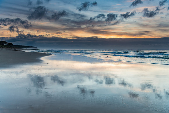 Sunrise Seascape with Clouds and Ships on the Horizon