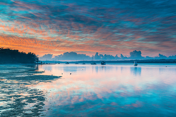 Sunrise Waterscape with High Cloud and Boats
