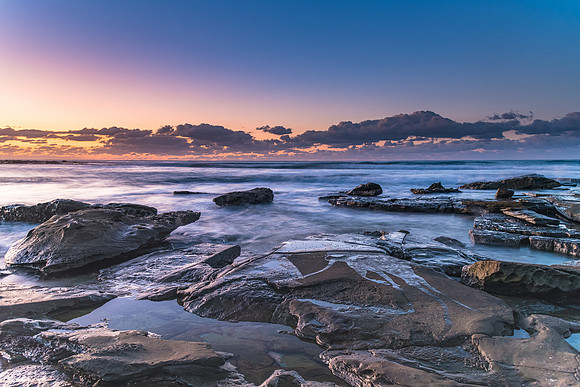 Dawn Seascape with a low cloud bank