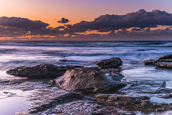Sunrise Seascape with a low cloud bank