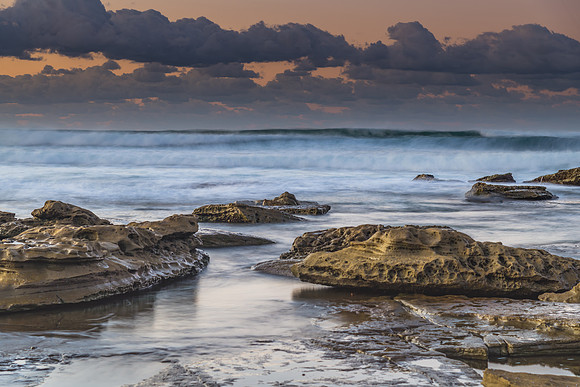 Sunrise Seascape with a low cloud bank
