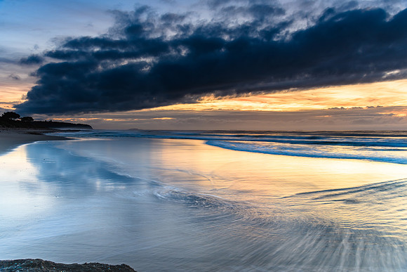 Sunrise Seascape with Clouds and Ships on the Horizon
