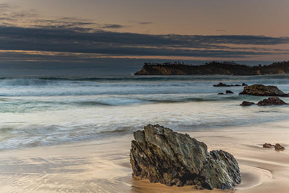 Sunrise seascape and low cloud bank