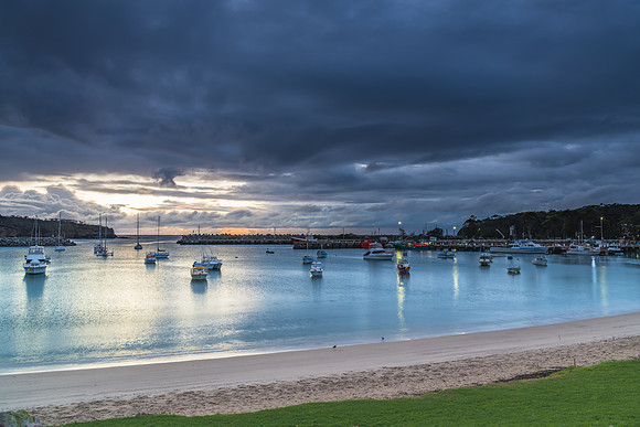 Seaside harbour overcast seascape with boats