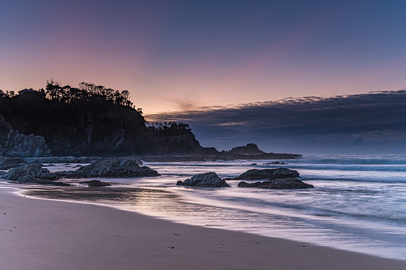 Sunrise seascape and low cloud bank