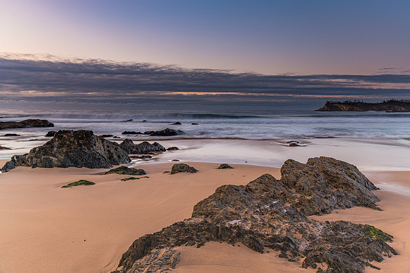 Sunrise seascape and low cloud bank